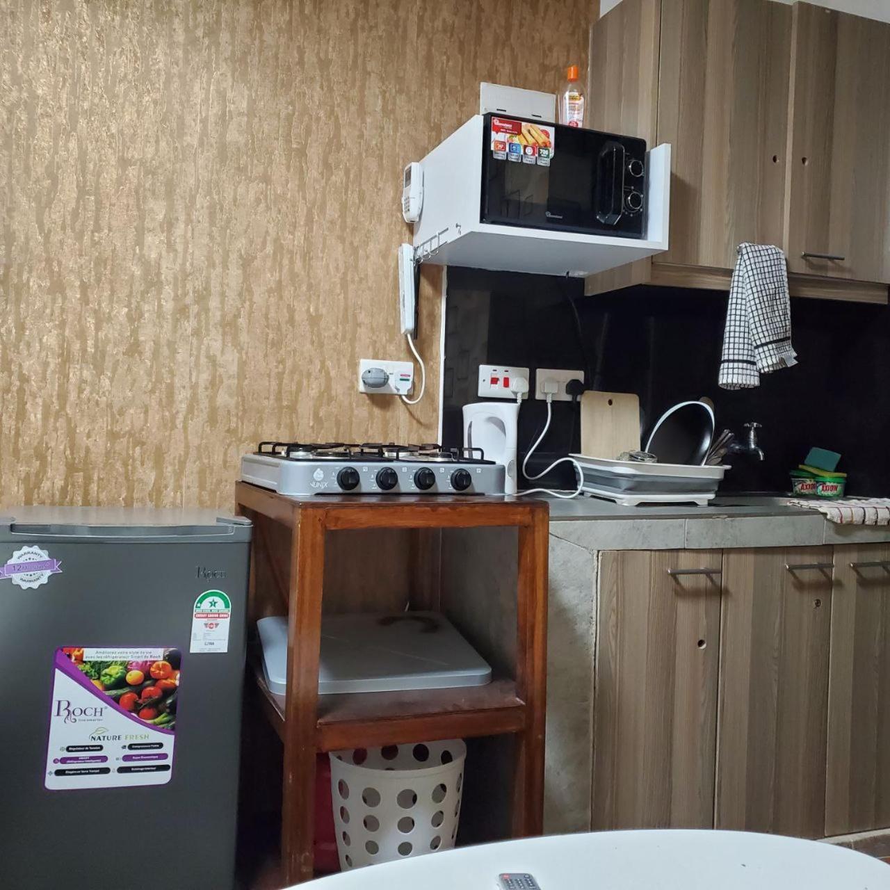 Lovely & Cozy Compact Studio Near Airport With Rooftop View Apartment Nairobi Exterior photo